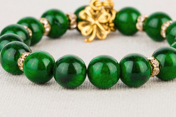 Beads jewelery as fashion background. Macro shot.