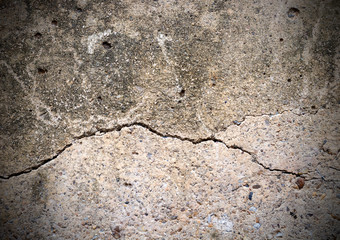 texture of cracked cement stone wall