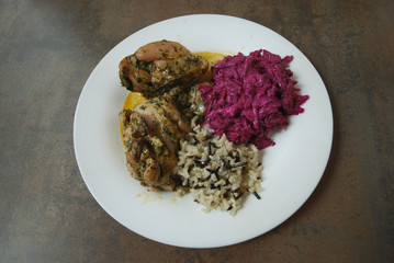 Chicken with wild and white rice and beetroot salad. The finished dish.