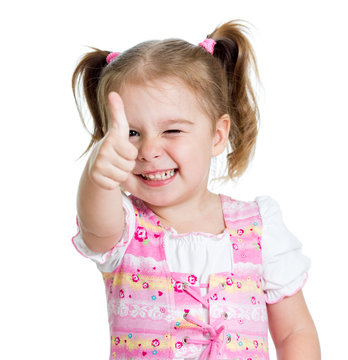 Funny little girl giving you thumbs up