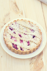 Homemade pie with coffee on a wooden background