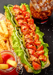 Homemade Hot Dogs with Onions, Cherry and Pickles.