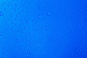 Naklejka na ściany i meble Blue water drops background