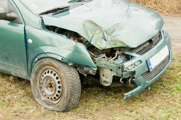 Green car have an accident