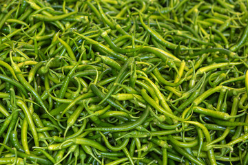fruits and vegetables on a food stall in market place