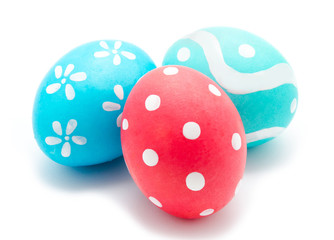 Three colorful handmade easter eggs