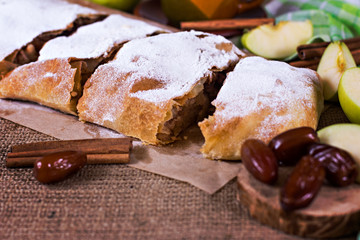 Apple strudel or apple pie  with dates and cinnamon