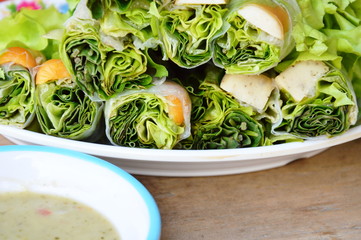 Thai fresh spring roll on dish and sour sauce
