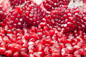 Cut pomegranate fruit macro photo