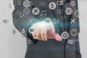 Businessman touch social media icons.