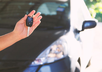 woman holding keys,new car.