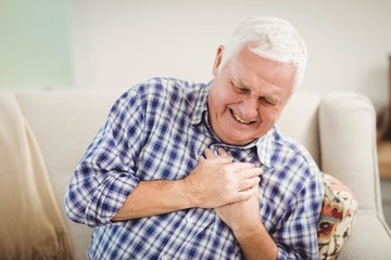 Senior man getting chest pain
