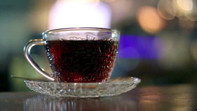 Black tea brewed with hot water, in a cafe