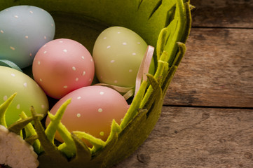 Eastern eggs in green basket 