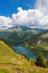 Naklejka na ściany i meble Lago di Campo - Adamello Trento Italy / Campo Lake 1944 m. and Copidello Lake, small beautiful alpine lakes in the National Park of Adamello Brenta, Trentino Alto Adige, Italy