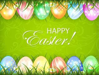 Green Easter background with eggs in grass