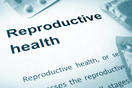 Paper With Words Reproductive Health And Contraceptives.