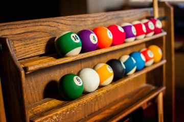 Horizontal photo of Set of balls for a game of pool billiards on