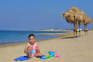 Real toddler girl enjoying her summer vacation