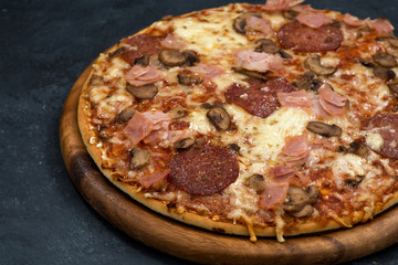 whole pizza with cheese and sausage