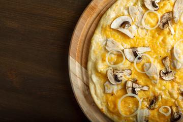 Delicious italian pizzas served on wooden table