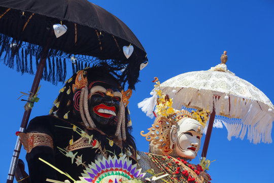 Barong Landung traditional protective spirit of Bali in human body at ceremony Melasti before Balinese New Year and silence day Nyepi. Holidays, festivals, rituals, art, culture of Indonesian people.