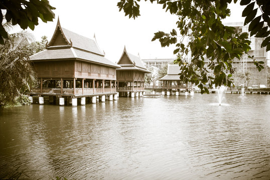 Black and white tine Thai house style along the River, Thailand