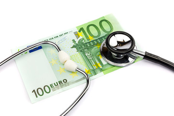 Hundred euro note with professional stethoscope on white backgro
