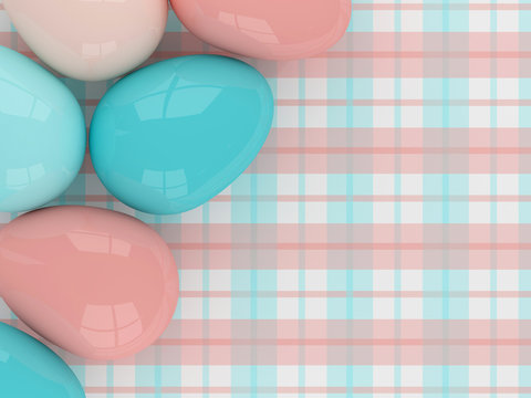 pastel Easter eggs lying on plaid pattern