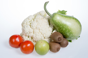 cauliflower,kiwi,tomatoes,jujubes and bottle gourd isolated on white background