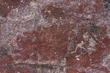 Red stone texture, granite surface. Rock pattern background