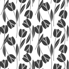 Abstract seamless retro pattern with silhouettes of tulips . Floral design . Textile Design . Vintage background with flowers