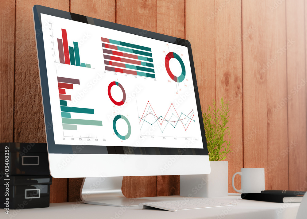 Fototapete modern workspace with computer showing graphs and charts