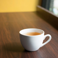 cup of tea on wooden table