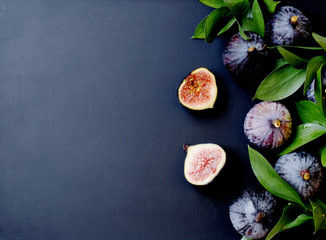 figs with leaves on a black, selective focus