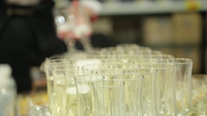 In glasses with champagne throw dry ice. - Powered by Adobe