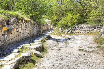 Crimea. Chufut-Kale spelaean city is a fortress. Medieval road