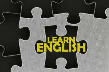 Fototapeta premium jigsaw puzzle written word learn english