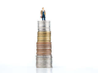 business cartoon charactor standing on metal coin