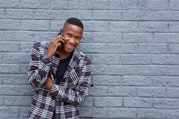 Young african man talking on cellphone