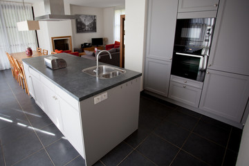 A kitchen in a bright house