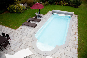 Swimming pool with stone deck top view