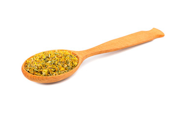 Dry calendula in spoon