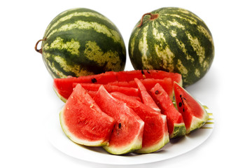 Whole or sliced watermelon on a white background