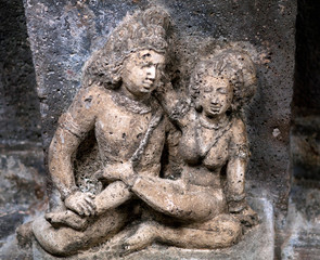 Fototapeta na wymiar Stone figure of lovers in Ajanta caves, India
