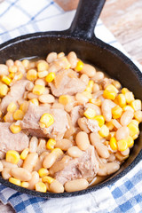Meat stew with beans and corn