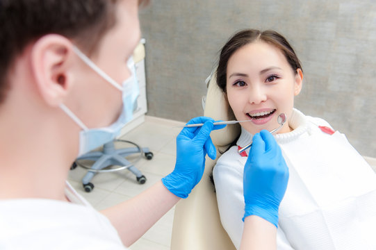 Young female patient at dentist office
