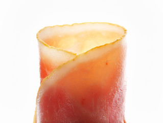 Thin slices of cooked ham, rolled up