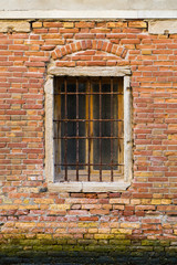 Fototapeta na wymiar Old Windows in Venice with Bars