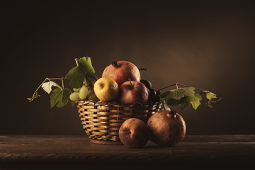 Fruit in a basket still life © stokkete